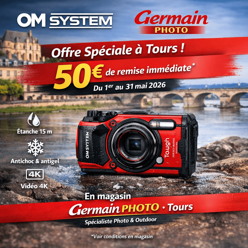 Promotional banner for Germain Photo Tours advertising a 50€ immediate rebate on tours, featuring a red OM System camera by a river and cityscape backdrop.